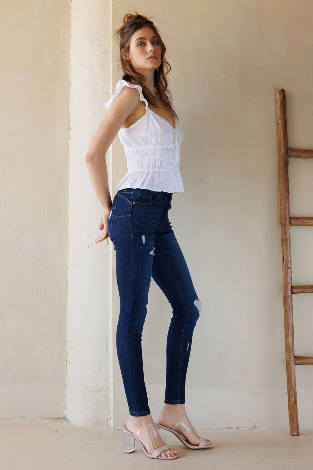 Mid Rise Destructed Skinny Jeans