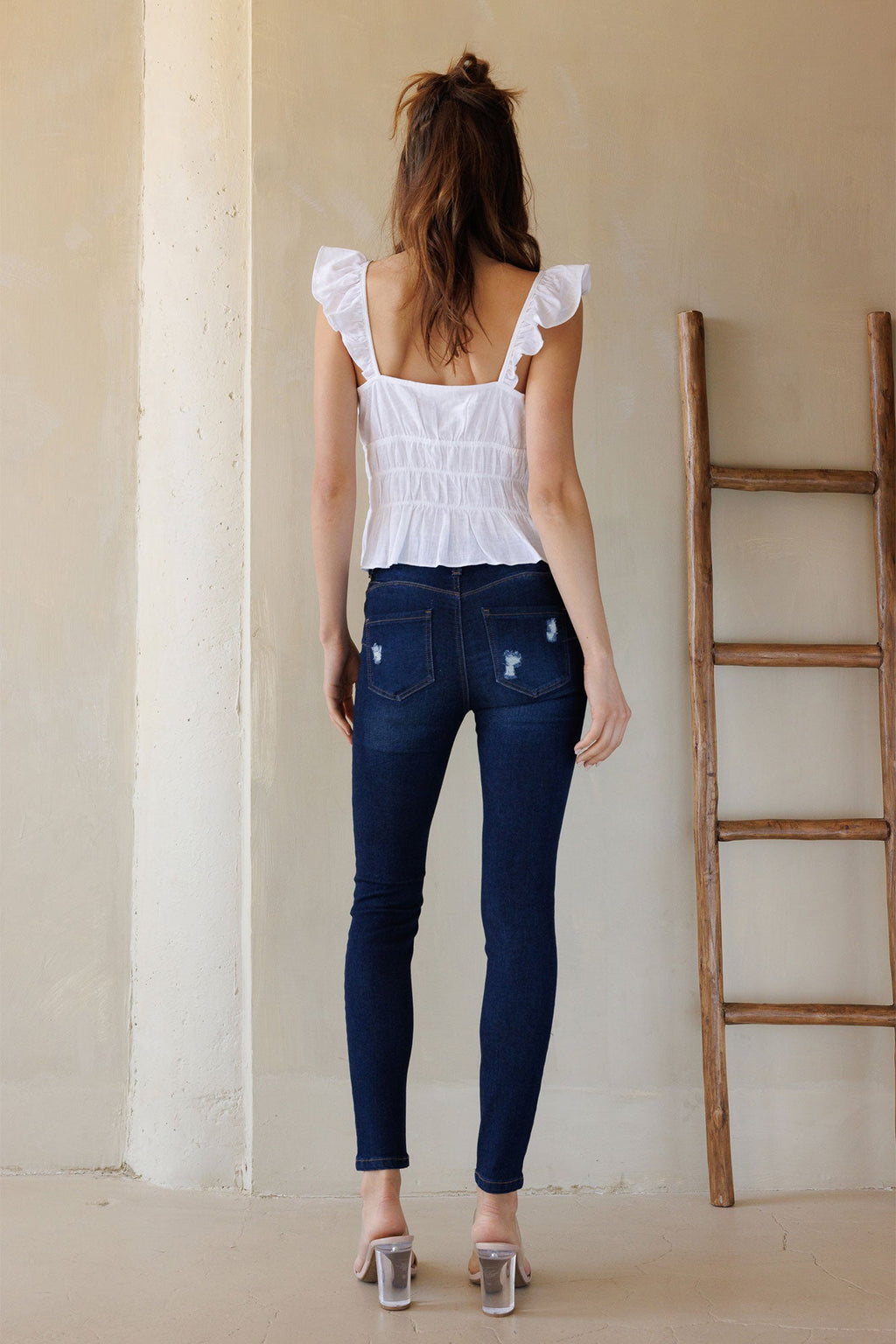 Mid Rise Destructed Skinny Jeans