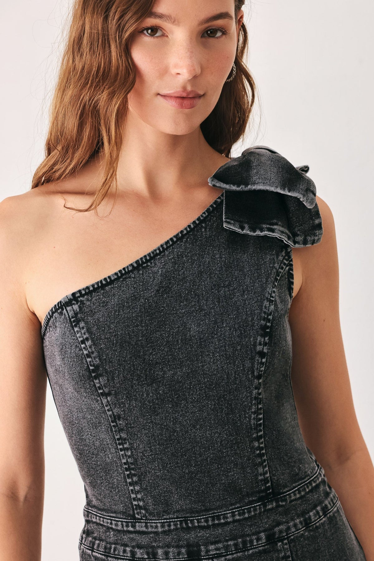 GRAPHITE PETAL EDGE DENIM JUMPSUIT